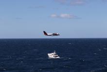 Dornier flying over superyacht