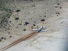 Aerial view of the plane landed on a salt lake