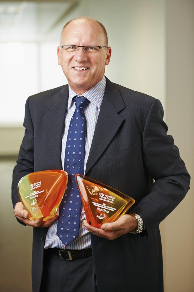 CEO Warwick Norman with RightShip’s two Australian export awards: Prime Minister’s Australian Exporter of the Year award, and the Business Services Award