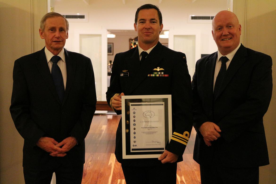 Lieutenant Commander David O’Toole (middle) accepted the Commendation Award on behalf of the crew of the Navy Seahawk helicopter Tiger 74. Pictured with National Search and Rescue Council Chairman John Young (left) and AMSA Chief Executive Officer Mick Ki
