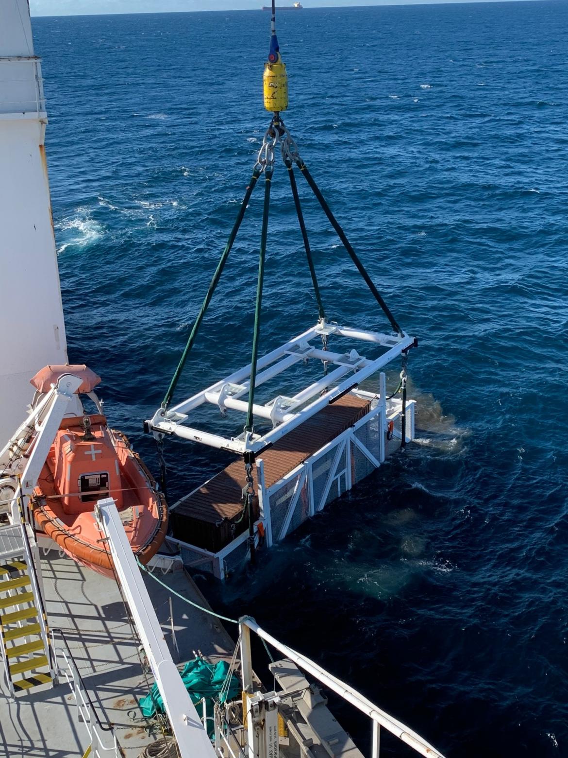 The first container lifted from the sea bed.