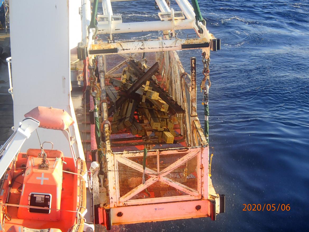 Recovery of steel beams spilled out of containers 