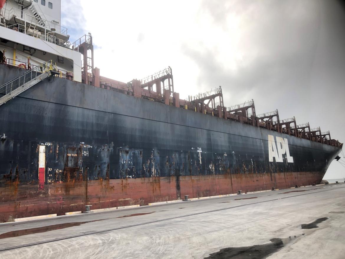 From the dock looking up you can see the side of the APL England with no containers at the top