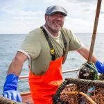 Fisherman smiling