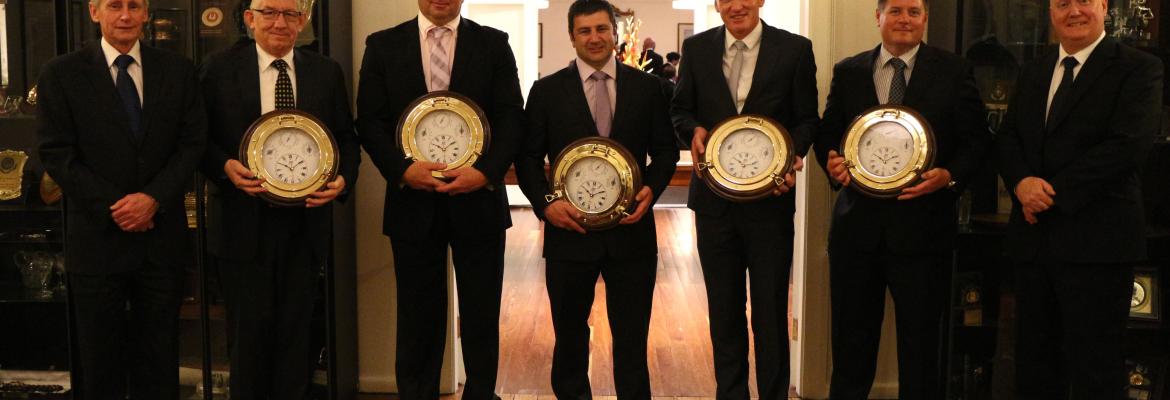 Tasmania Police officers (from second left) Inspector Lee Renshaw, Sergeant John Pratt, Senior Constable Robert Round, Senior Constable Darren Leary and Senior Constable Ben Cunningham were presented with the Australian Search and Rescue Award by National