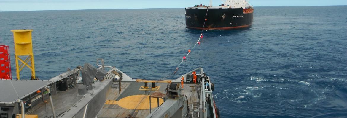 back of boat towing ship