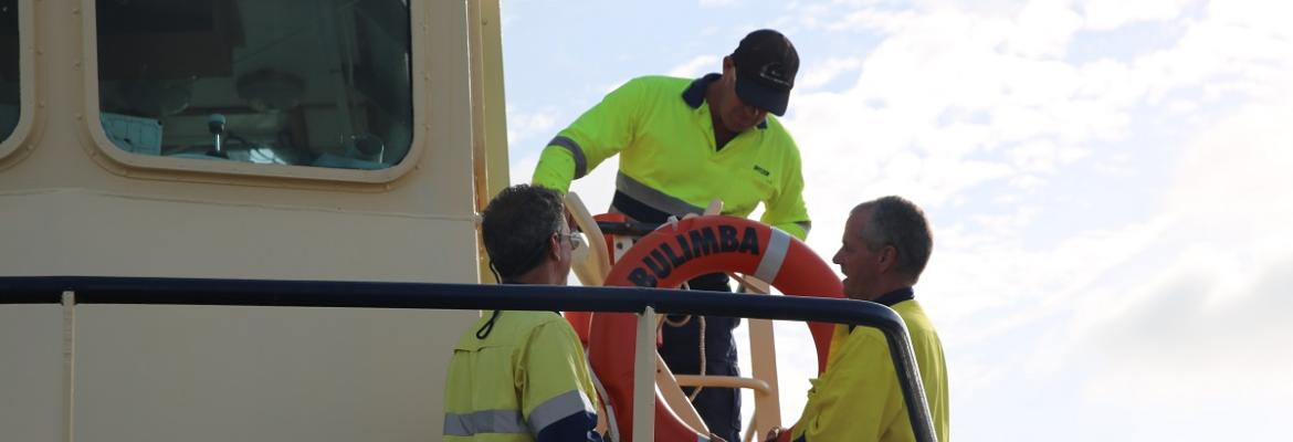 men inspecting ship